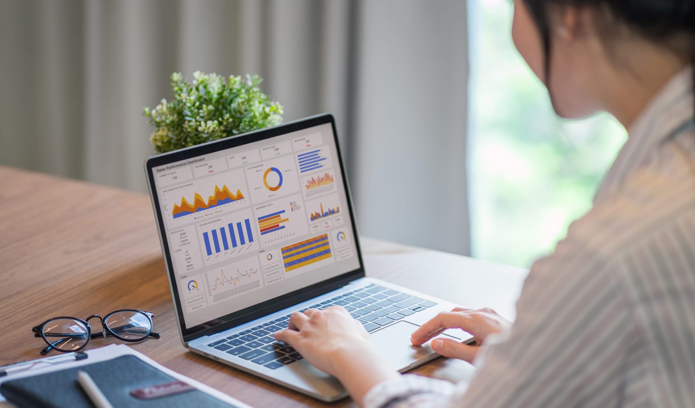 Advisor financial business analytics woman team analyzing data charts, graphs, and a dashboard on laptop screen. Data analysis concept.