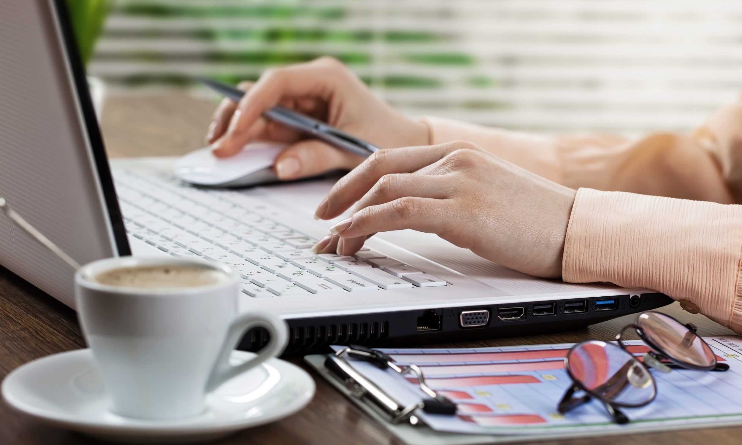 businesswoman-working-office-with-items-doing-business