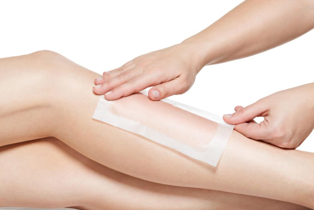 woman-depilating-her-legs-by-waxing-1