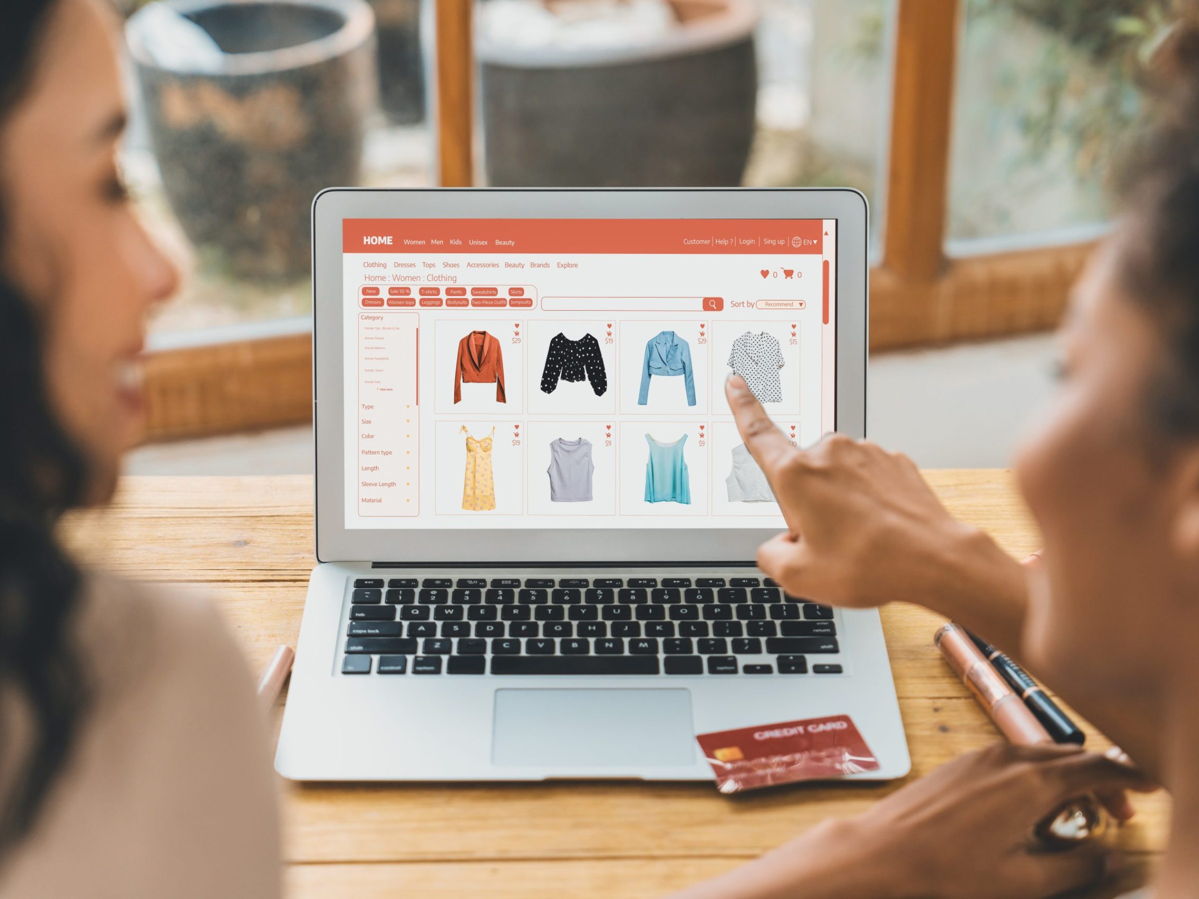 Woman shopping online on internet marketplace browsing for sale items for modern lifestyle and use credit card for online payment from wallet protected by crucial cyber security software